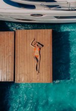 free-photo-of-a-woman-lying-on-a-pier.jpeg